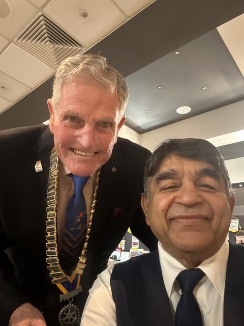 Rakesh Raizada with a Rotary club president wearing his chain of office