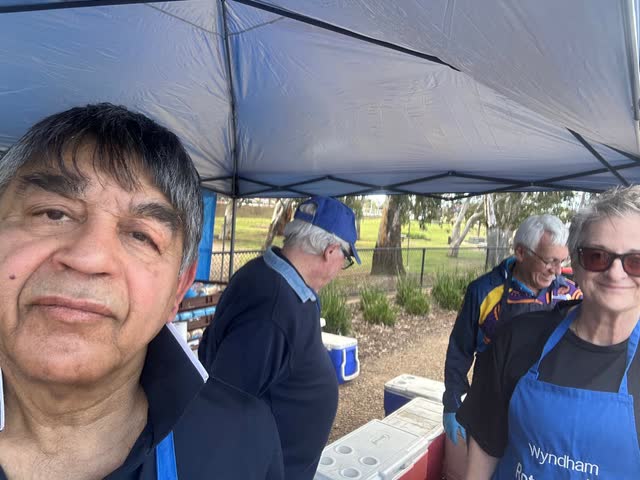 Selfie of Rakesh Raizada with Wyndham Rotary volunteers at a community barbecue