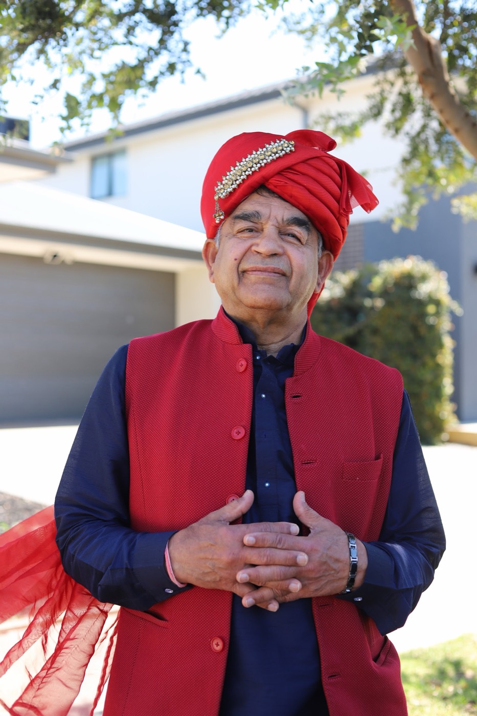 Rakesh Raizada in traditional red attire