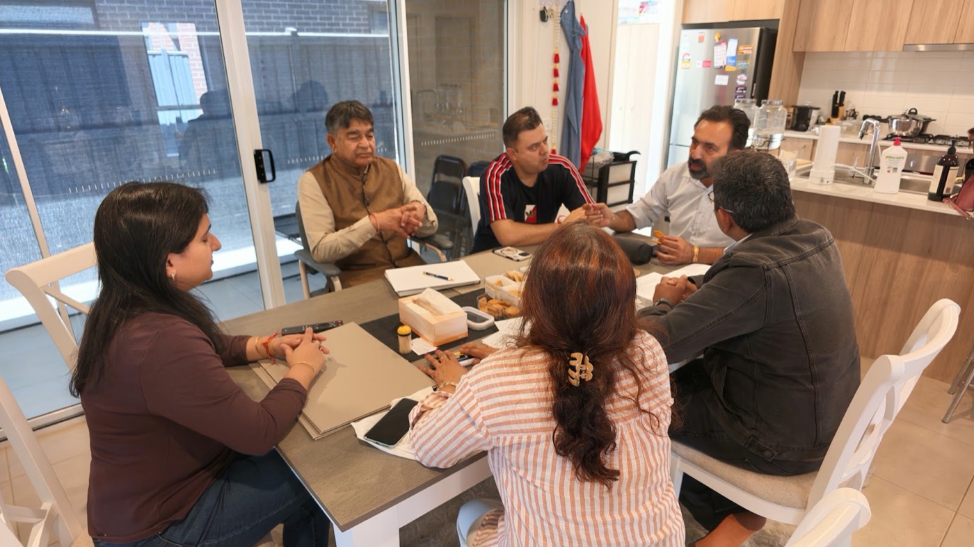 Rakesh Raizada meeting community members